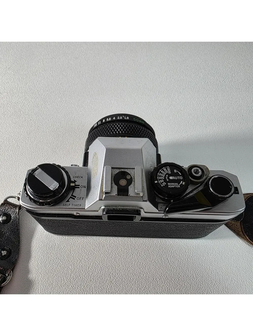 Olympus OM10 With Zuiko 50mm F1.8 Lens W/Neck Strap & Manual